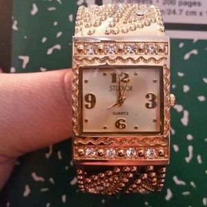 Woman's Studio Gold and Diamond Quartz Watch
